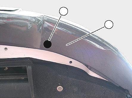 To avoid scratches and other damage, place bumper trim on a clean surface.