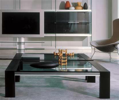 TAVOLINI ROCKY 1 design: Pierangelo Gallotti Tavolino con piano in cristallo 15mm. Gambe in rovere sbiancato, tinto wengé, oppure in faggio tinto ciliegio o noce.