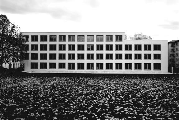 Zweischalenmauerwerk aussen verputzt, Schulhaus Ackermätteli, Basel,