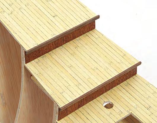 19I Feilen Sie die Holzleisten oben ab, damit sie mit den Deckplanken bündig