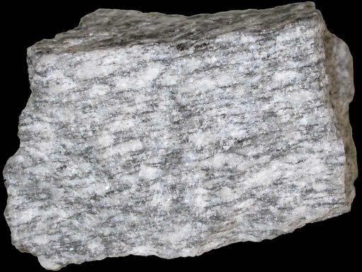 Gneis Umwandlungsgestein (= metamorphes Gestein) Veränderung der Mineralien bei grossem Druck und Hitze (z. B.