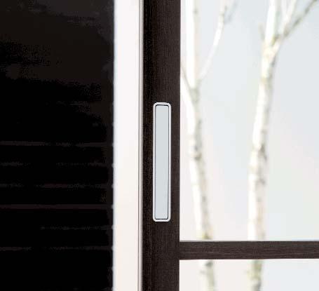 Double sliding door with frame and crossbars in black anodized aluminium.