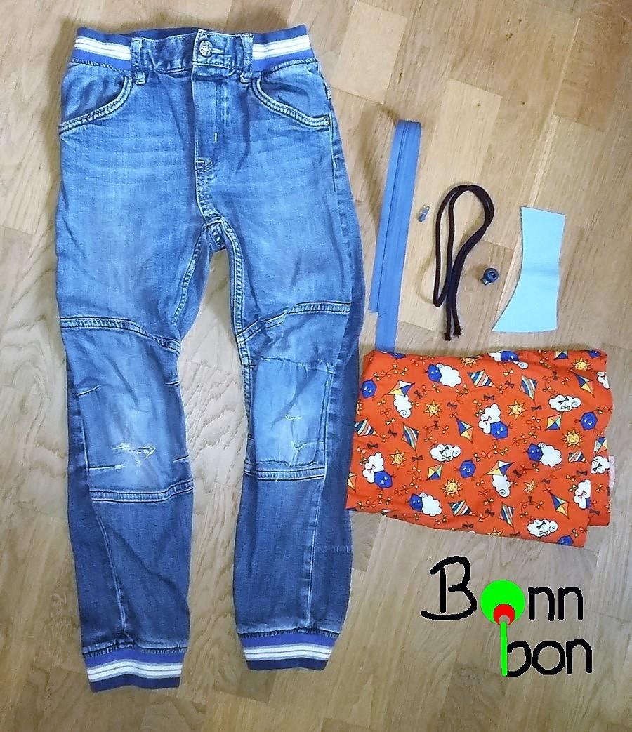 Du benötigst: eine alte Hose/Jeans etwas Stoff für den Innenbeutel der Tasche und die innen liegende Reißverschlusstasche etwa 20 cm Endlosreißverschluss plus Zipper, oder einen fertigen
