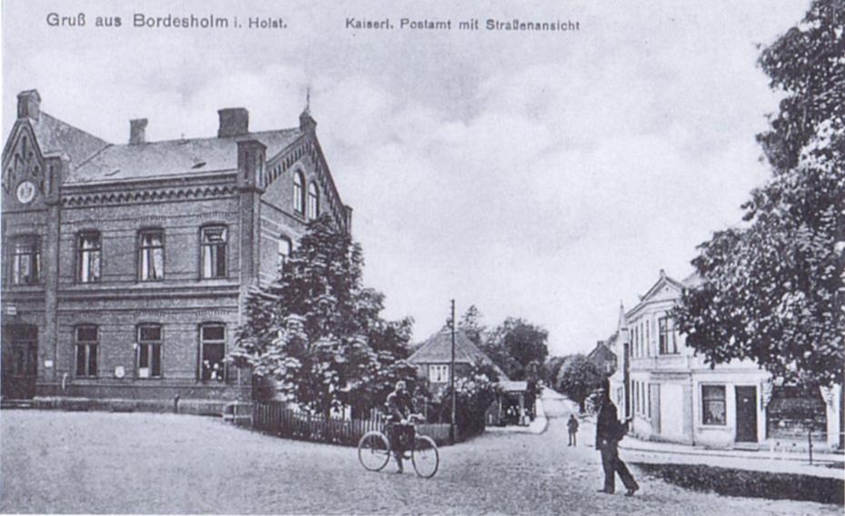 Die Postkarte um 1910 zeigt das Kaiserliche Postamt an der Ecke zur Wildhofstraße.