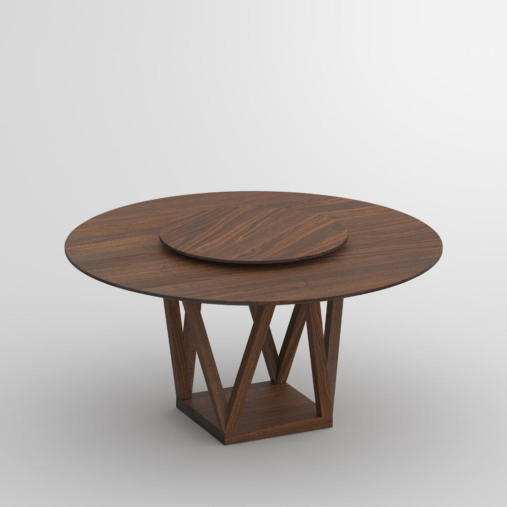 CREO Tisch mit Eleganz Die runde Form aus Massivholz wirkt mit ihrer warmen Ausstrahlung besonders einladend und ist wie geschaffen für ein lockeres Abendessen in Gesellschaft.