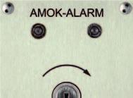 Alarmauslöser Schlüsselschalter Der Funkschlüsselschalter mit der Aufschrift AMOK-ALARM kann nur von Personal bedient werden das über einen für den Zylinder passenden Schlüssel verfügt.