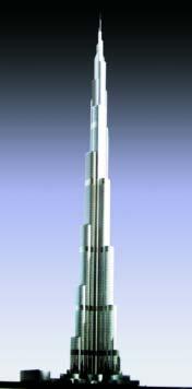 Bild 7: Modell des über 700 m hohen Burj Dubai (Abb. EMAAR) Freistehende Verteilermaste ohne Gegengewichte klettern mit der Schalung Die Maste MX 28 stehen frei auf 16 m hohen Rohrsäulen.