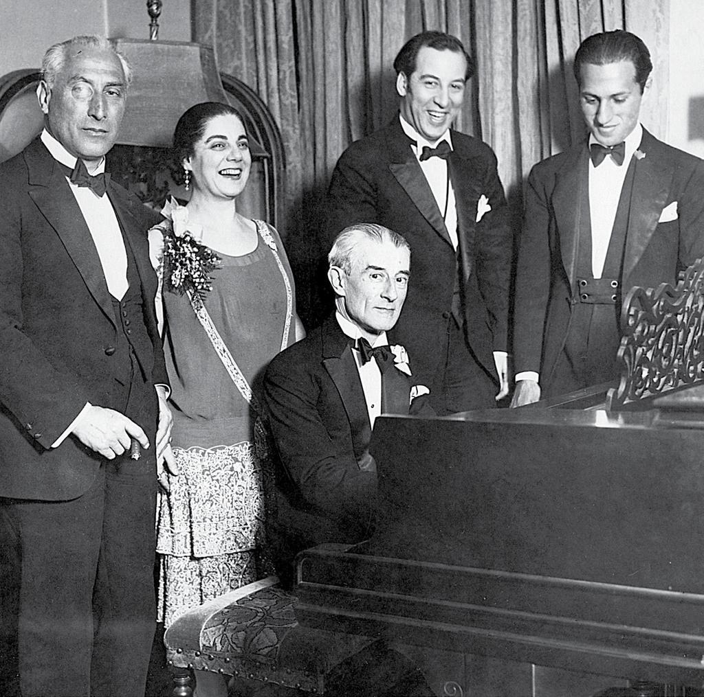 DEUTSCH ACKNOWLEDGMENTS MORE by and and George ABOUT birthday party for held in New is posed sitting behind the piano, a grinning, his eyes fixed on s fingers resting on the keyboard.