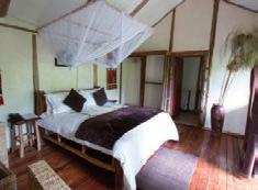 Ausstattung: Die geräumigen Cottages sind mit besonders großen Betten, einer Sitzgruppe, einer Terrasse mit Blick auf den Kratersee und einem Bad mit Dusche und Wanne ausgestattet.