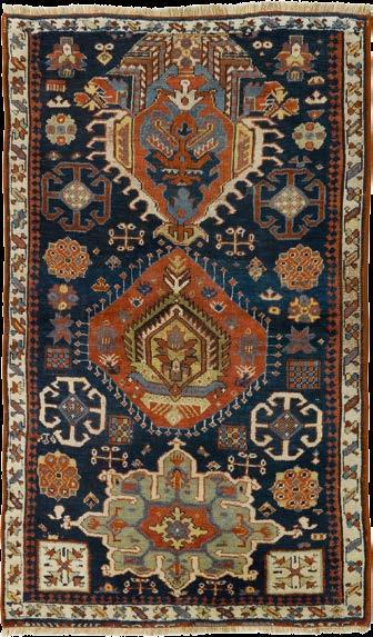 1544* KARAGASHLI ANTIK. Blaues Innenfeld mit 3 roten Medaillons. Der ganze Teppich geometrisch gemustert. Gelbe Weinglasbordüre. Leichte Gebrauchsspuren. 100x163 cm.