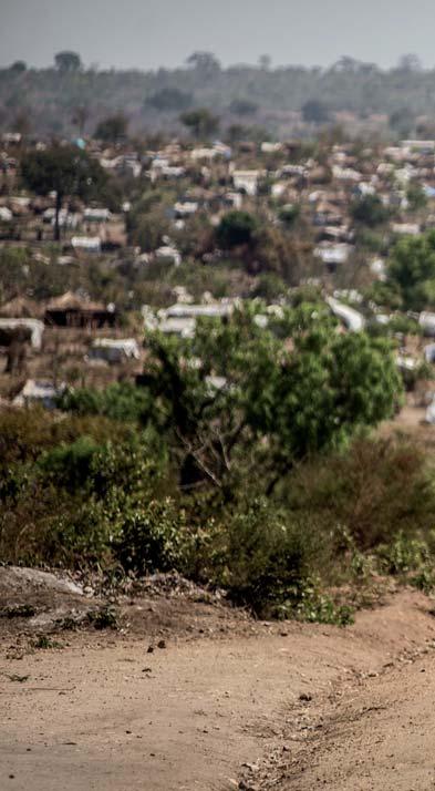 UGANDA Eine Stadt im Niemandsland: eines der Flüchtlingscamps im Norden Ugandas. (Foto: trocaire, CC BY) Salah Iwi Hilary Simon hat die Angriffe auf sein Dorf überlebt.