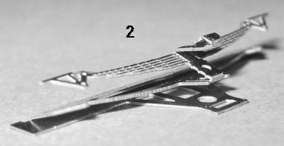 letzten Stück durch eine 90 Biegung dargestellt, die Achshalterbleche von innen verlöten Achshalter(3) für die mittlere Achse beidseitig um 90 abkanten Bremsbacken an den Bremsgehängen(4) um 180