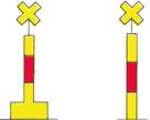 Wenn ein Warngebiet durch das Zeigen weiterer Sichtzeichen vorübergehend zum Sperrgebiet werden kann, tragen die Tonnen oder Stangen zusätzlich ein gelbes liegendes Kreuz als Toppzeichen.
