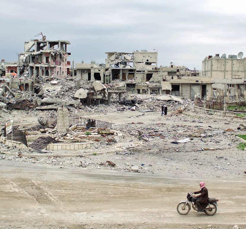 8 Warum Menschen fliehen Krieg und Gewalt Ort des Krieges, aber auch des Überlebenswillens in Syrien: Die kurdische Symbolstadt