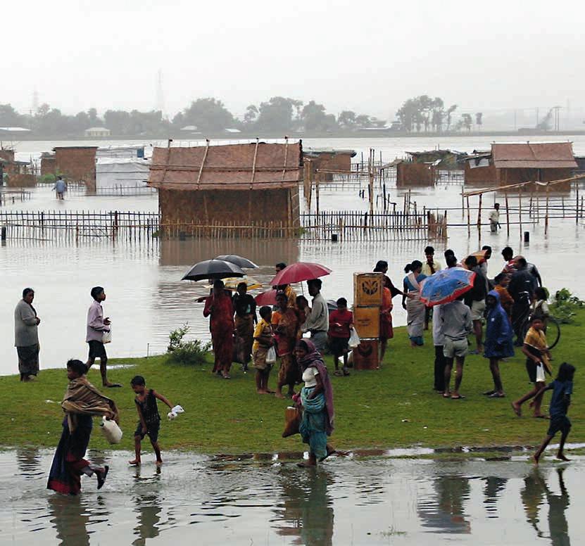 24 Warum Menschen fliehen Umweltzerstörung und Klimawandel In Bangladesch ist das Haus am Meer ein Fluchtgrund.