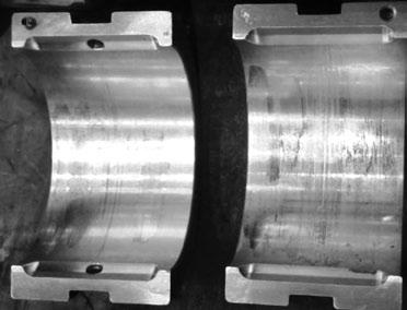 Abbildung 11: rechte äußere Lagerschale Abbildung 12: Gleitlagerung Industriegetriebe mit starker Riefenbildung an der rechten Schale Abbildung 13: Gleitlagerung Industriegetriebe mit Materialabtrag