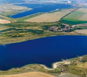 Sachsen-West Projekt 085 Tagebau Espenhain Die Böschungsendgestaltung des Bereiches der 36er Niederfahrt zum Tagebau wurde abgeschlossen. Die Sanierung der Altlast Raupenstützpunkt ist erfolgt.