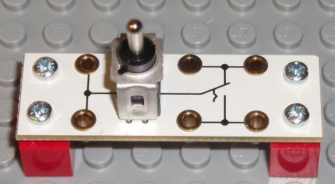 Dies ist ein Kipp-Schalter Beispiele: Lichtschalter, Ein-Aus-Schalter an elektrischen Geräten Der Taster Foto Schema-Symbol Rast-Symbol fehlt Der Taster ist