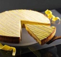 Cheesecake Limoncello Artikel-Nummer: 63161 1350 g / Stück, in 14 Portionen vorgeschnitten, Ø 26 cm