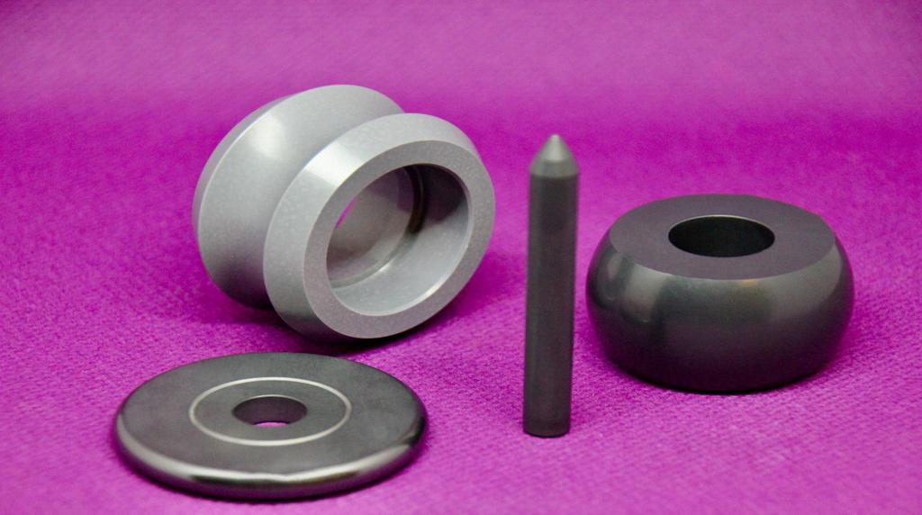 Siliziumnitridkeramik Komponenten für Metallumformung Bauteile aus Siliziumnitrid finden Anwendung im Armaturenbau, in Umformtechnik, Schweiß-, Löt- und