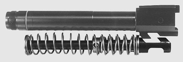 - Hold the recoil/buffer spring guide rod with the thumb and insert the grip from the rear into the guiding grooves of the slide (see