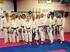 Unterstützung karatespezifischer Bewegungen durch Übungen mit dem Deuserband