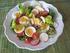 Vorspeisen. Bunter Salat mit Tomate, Gurke und Paprika dazu Sylter Dressing und krosse Brotchips 5,00